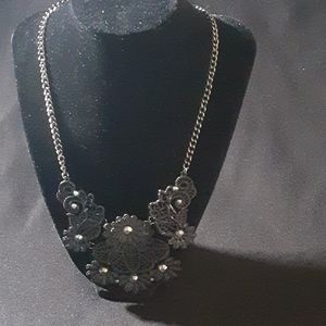 Black floral patterned necklace